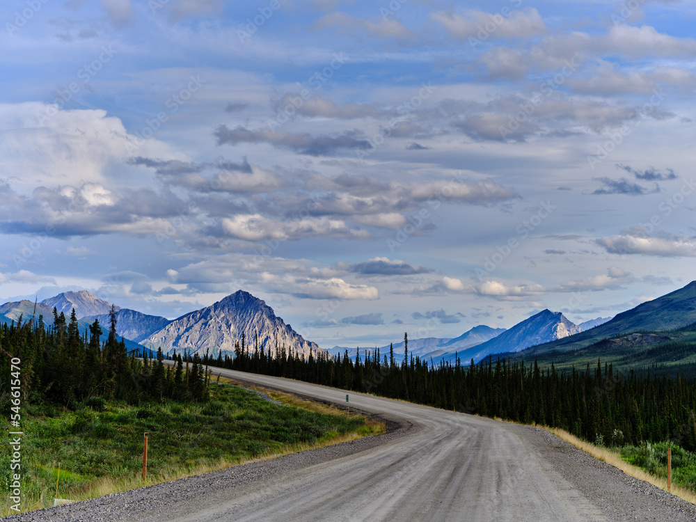 The gravel Dalton Highway cuts through the Rugged mountains on the