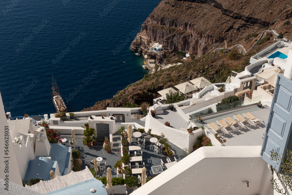 Santorini, Greece Europe. 2022. Looking down on Gialos the old port in Fira, Santorini from the town centre.