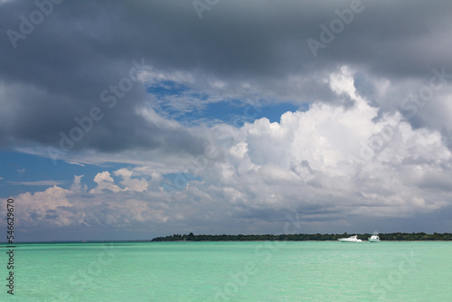 Turquoise Caribbean sea and blue sky with cloud  Saona