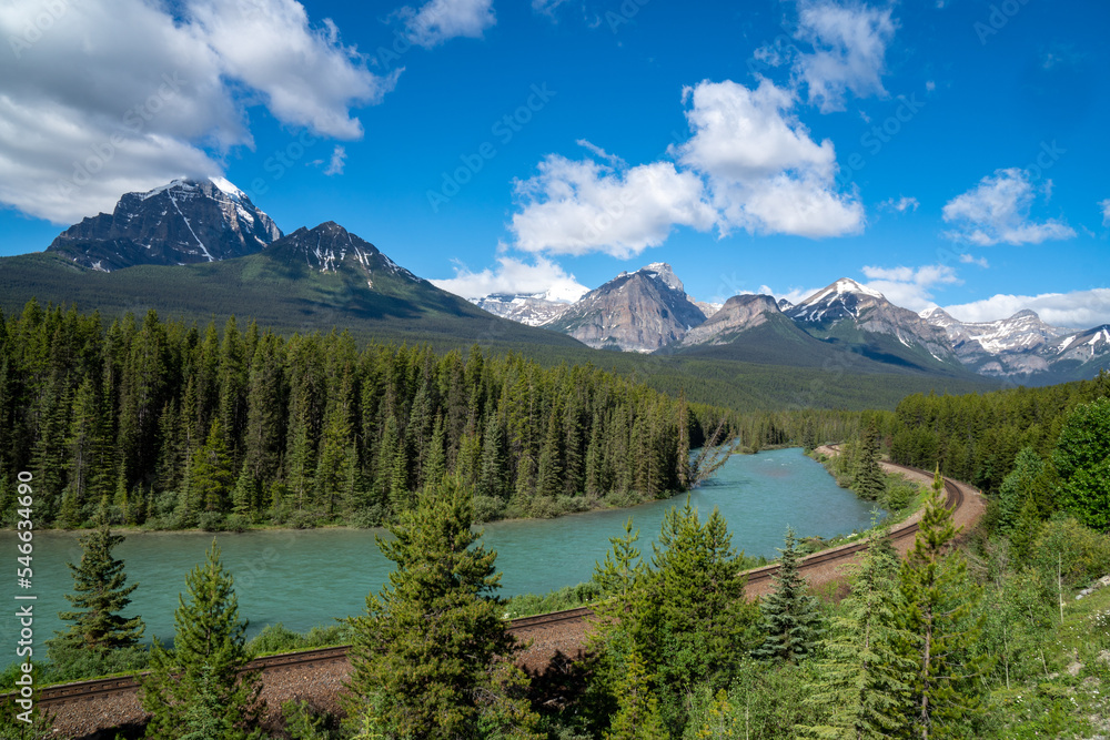 Morants Curve train tracks through the Canadian Rockies in Banff National Park in the summer, without a train