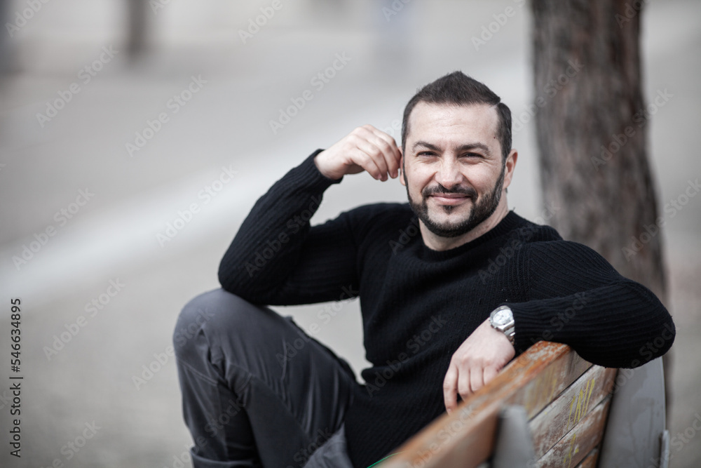 Obraz premium Natural looking guy posing outdoors, wearing casual clothes