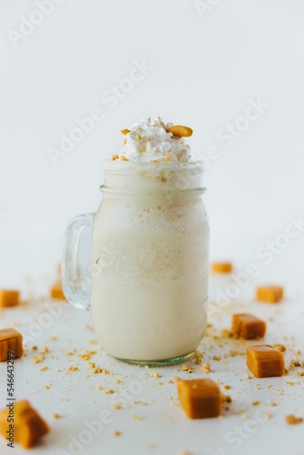 Vertical shot of refreshing caramel milkshake