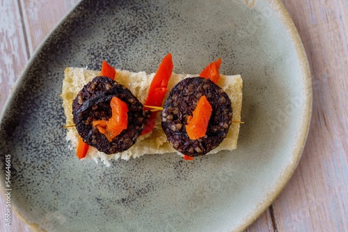 Burgos blood sausage with red peppers. Typical Spanish tapa skewer