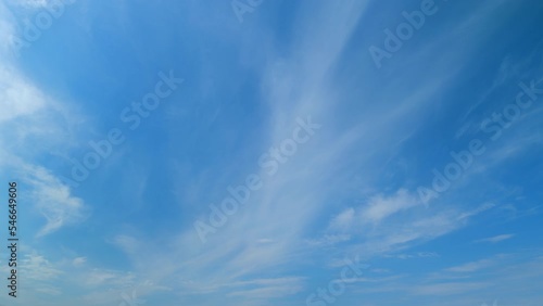 Tropical summer sunlight and sunrays. Colorful clouds in the sky after heavy rain. Timelapse. photo