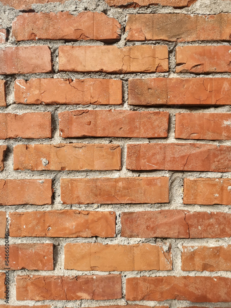The wall made of an old brown bricks The wall made of an old brown bricks