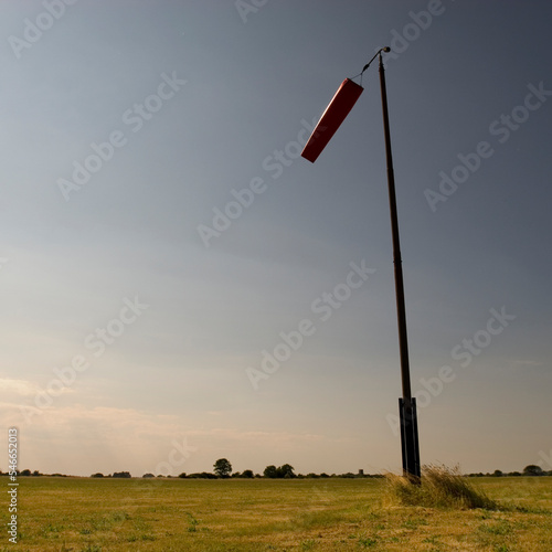 Vintage World War II wind sock stands at Tibenham Air Field, Tibenham, United Kingdom. photo