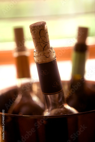 Closeup of corked wine bottles. photo