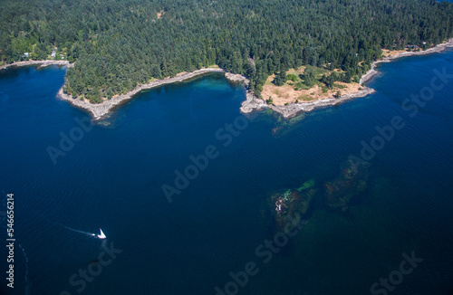 A sailboat off the coast of Vancouver Island, Canada. photo