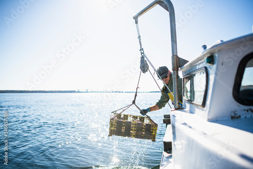 Pulling pots for conch shellfishing on Narragansett Bay photo