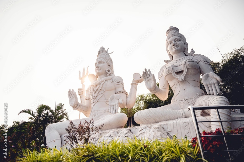 Fototapeta premium White Shiva and Parvathi statues on Kailasagiri hill in Andhra Pradesh state, Visakhapatnam, India