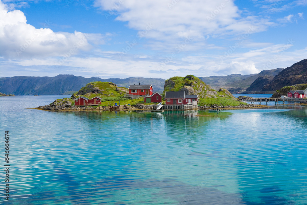 Fishing village with traditional red rorbu at Trollholmen island, Mageroya, Norway