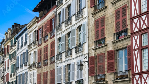 Bayonne in the pays Basque, typical facades with colorful shutters in the historic center
 photo