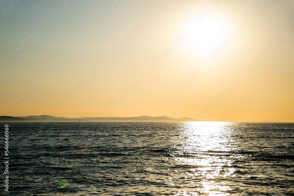 Fototapeta premium Sunset over the Adriatic sea and Ugljan island seen from Zadar, Croatia.