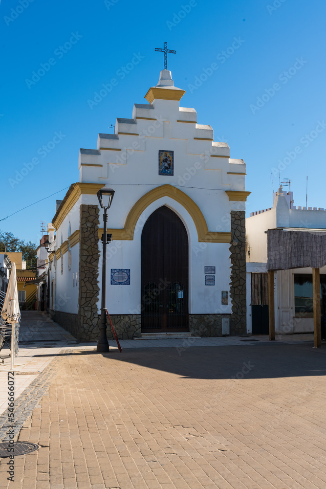 Obraz premium Charming fisherman's chapel located on the beach and surrounded by some of the best eateries in Sanlucar de Barrameda, Andalusia, Spain