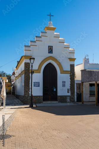 Charming fisherman's chapel located on the beach and surrounded by some of the best eateries in Sanlucar de Barrameda, Andalusia, Spain