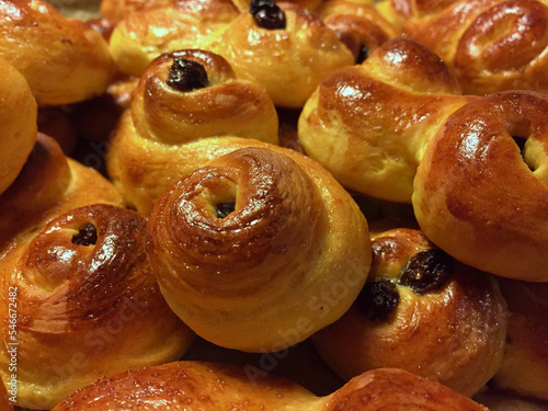 Homemade saffron buns a Swedish tradition before the Saint Lucia holiday in December. photo