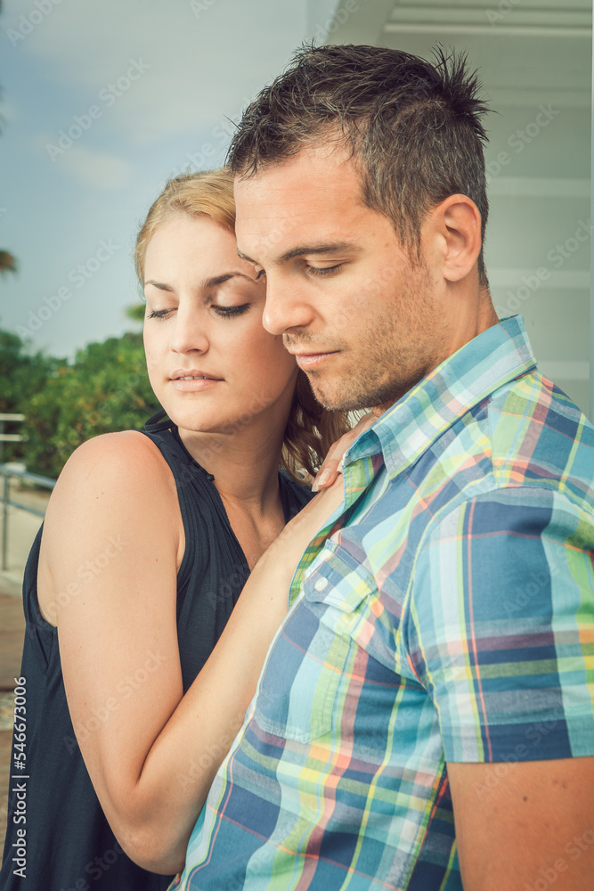 Fototapeta premium Young Couple in Love on the Beach or Resort