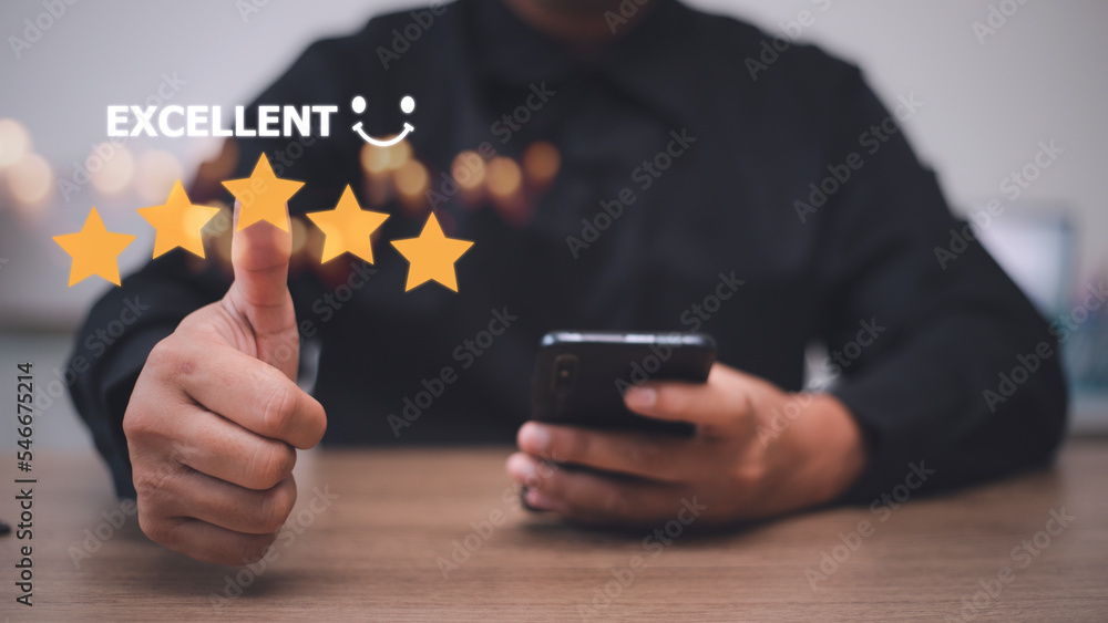 customer hand with gold five star rating feedback icon and press level excellent rank for giving best score point to review the service, business concept customer hand with gold five star rating feedback icon and press level excellent rank for giving best score point to review the service, business concept