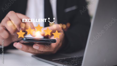Wallpaper Mural customer hand  with gold five star rating feedback icon and press level excellent rank for giving best score point to review the service, business concept Torontodigital.ca
