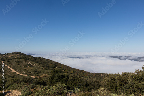 Alcoi from the red fountain mountain with fog, Alicante, Spain. photo