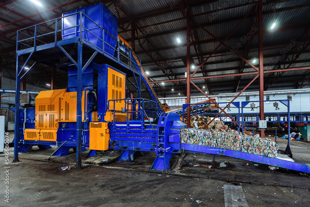 Modern waste processing plant. Sorting, pressing and packing of garbage