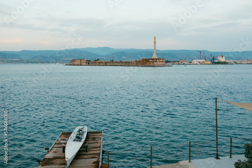 View of strait of messina and Reggio Calabria from island of Sicilia photo