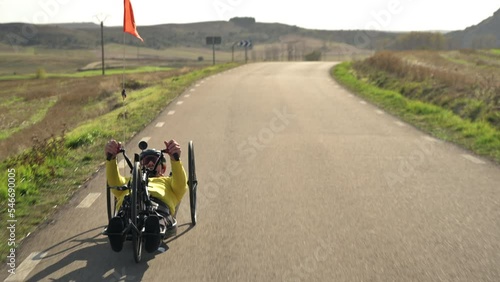 Athlete with disability training with His Handbike on a Track. High quality 4k footage photo