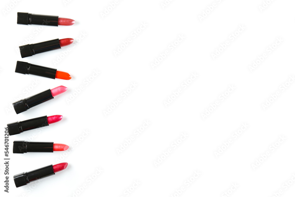 Close up shot of a single glossy lipstick isolated on white background with a lot of copy space for text. Close up shot of a single glossy lipstick isolated on white background with a lot of copy space for text.
