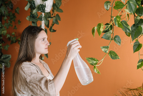 Girl Watering Plants photo