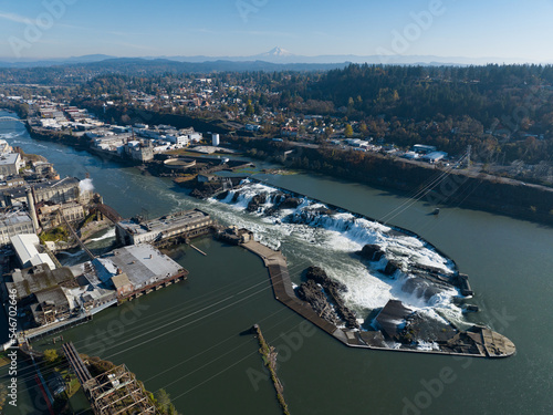 The Willamette Falls is a natural waterfall between West Linn and Oregon City, not far south of Portland, Oregon. By volume, this is the largest waterfall in the Northwestern United States. photo