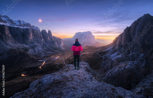 Woman on the rock and mount...