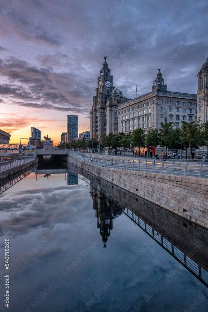 Royal Liver Building and the Museum in Liverpool, image captured at sunset in the city center downtown docklands