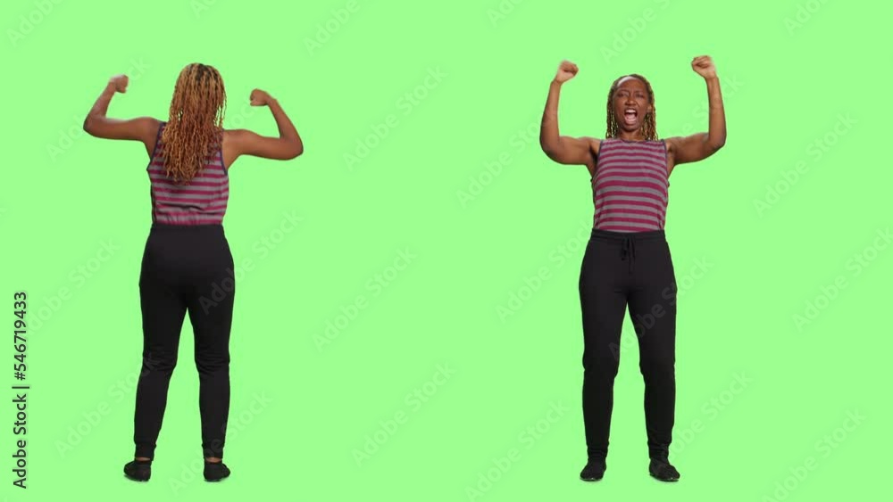 Smiling lovely girl being optimistic over green screen backdrop, full body on greenscreen. Positive woman cheering and supporting, being joyful and confident on studio background. Smiling lovely girl being optimistic over green screen backdrop, full body on greenscreen. Positive woman cheering and supporting, being joyful and confident on studio background.