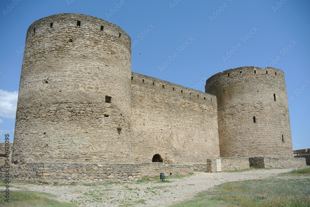 Ruins of the medieval castle wall in Europe in good weather 