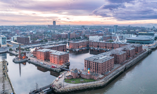 Aerial view Royal Albert Dock in Liverpool docklands in the city center, first rays in the morning