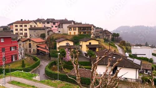 Panorama of Comano from Piazza Nag Arnoldi, Ticino, Switzerland photo
