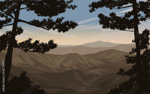 sunrise in the mountains with tree silhouette