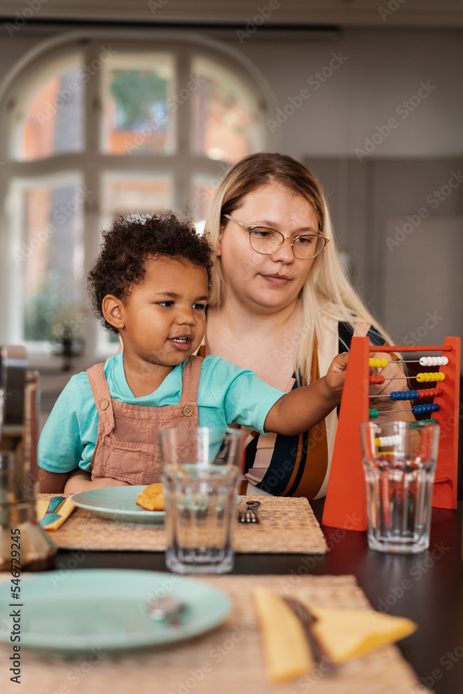 Woman Is Having Breakfast With Her Son Woman Is Having Breakfast With Her Son