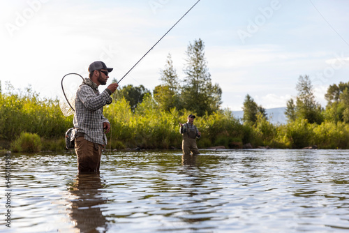 Fly Fishing focus for fisherman Provo River Utah in United States  photo