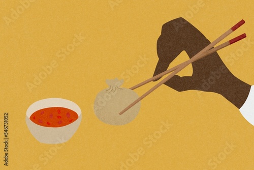 Chinese dumpling and chopsticks photo