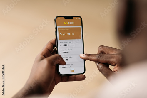 Man Checking Bank Account on Phone 
