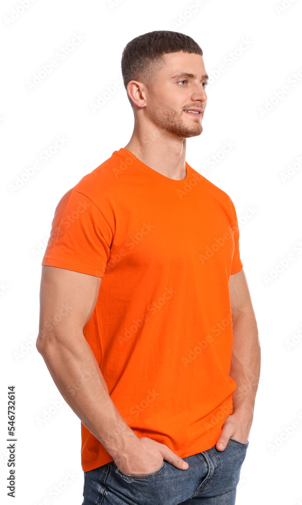 Fototapeta premium Man wearing orange t-shirt on white background. Mockup for design