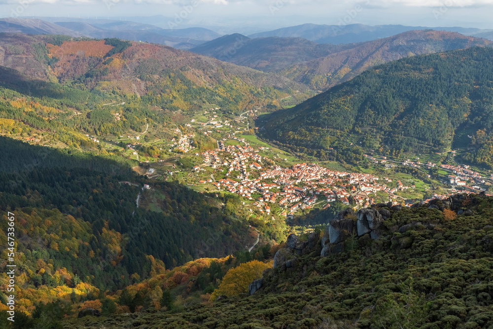 View over the village of Manteigas and the Zêzere river valley in Serra da Estrela, Portugal, in autumn. View over the village of Manteigas and the Zêzere river valley in Serra da Estrela, Portugal, in autumn.