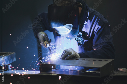 blacksmith making a weld
