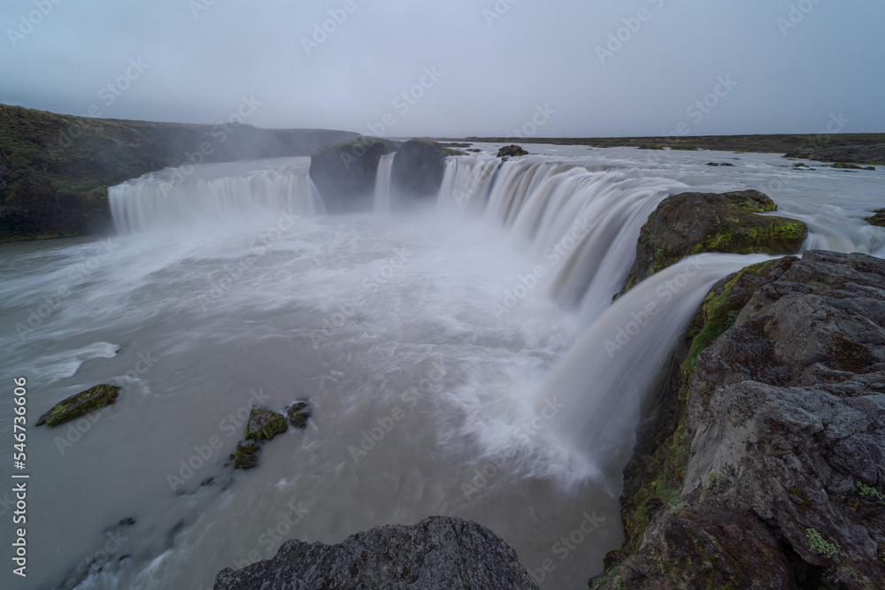 View of Godafoss Waterfall with a cloudy sky, Iceland View of Godafoss Waterfall with a cloudy sky, Iceland
