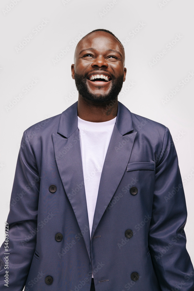 Cheerful black man in elegant suit Cheerful black man in elegant suit