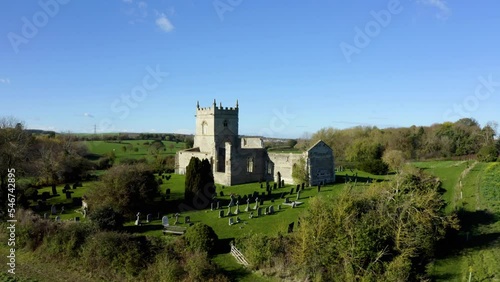 Ruins of old church in UK. Abandoned church in England. Ancient ruins of a Mediaeval church. Aerial. Drone view. 4k. St Mary's Church (ruin), Colston Bassett photo