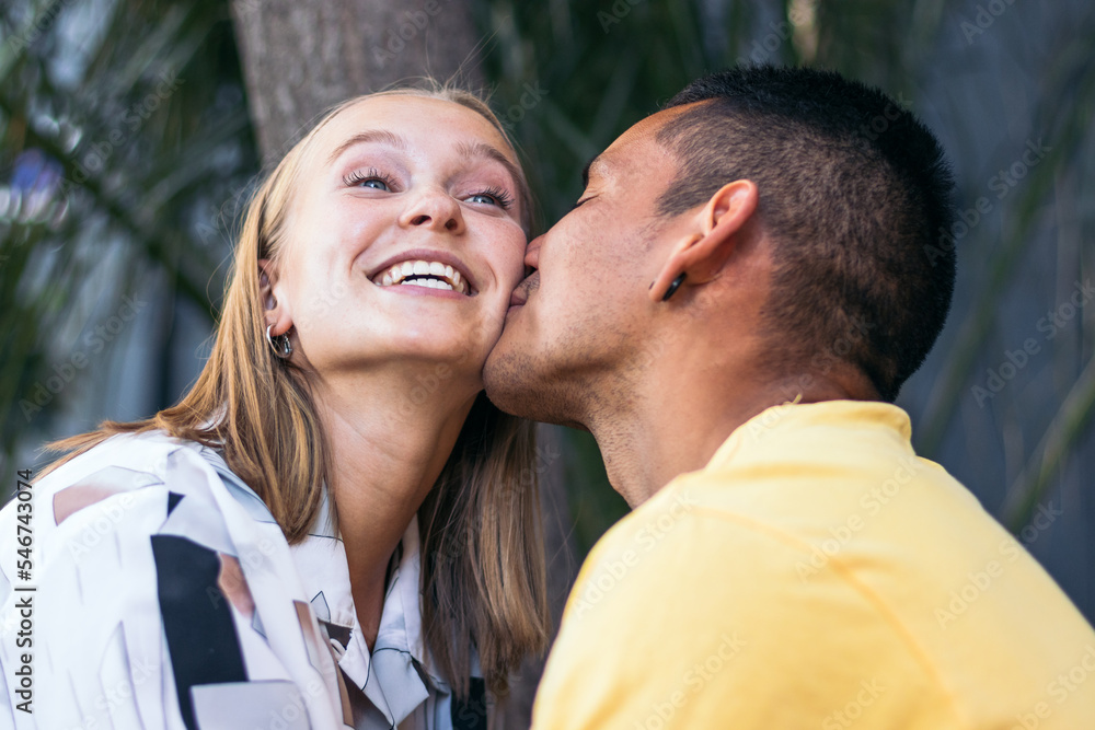 Happy young couple spending time together outdoors in the city Happy young couple spending time together outdoors in the city