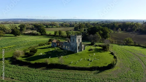 Ruins of old church in UK. Abandoned church in England. Ancient ruins of a Mediaeval church. Aerial. Drone view. 4k. St Mary's Church (ruin), Colston Bassett photo