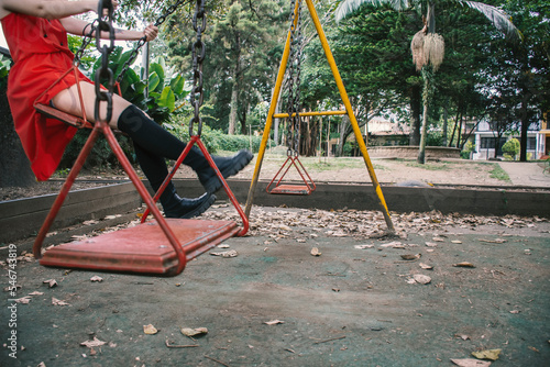 Swinging in the park photo